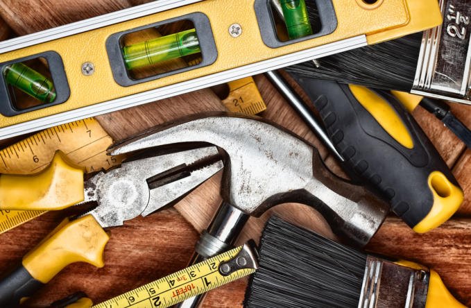 Set,Of,Manual,Tools,On,A,Wooden,Boards,Background